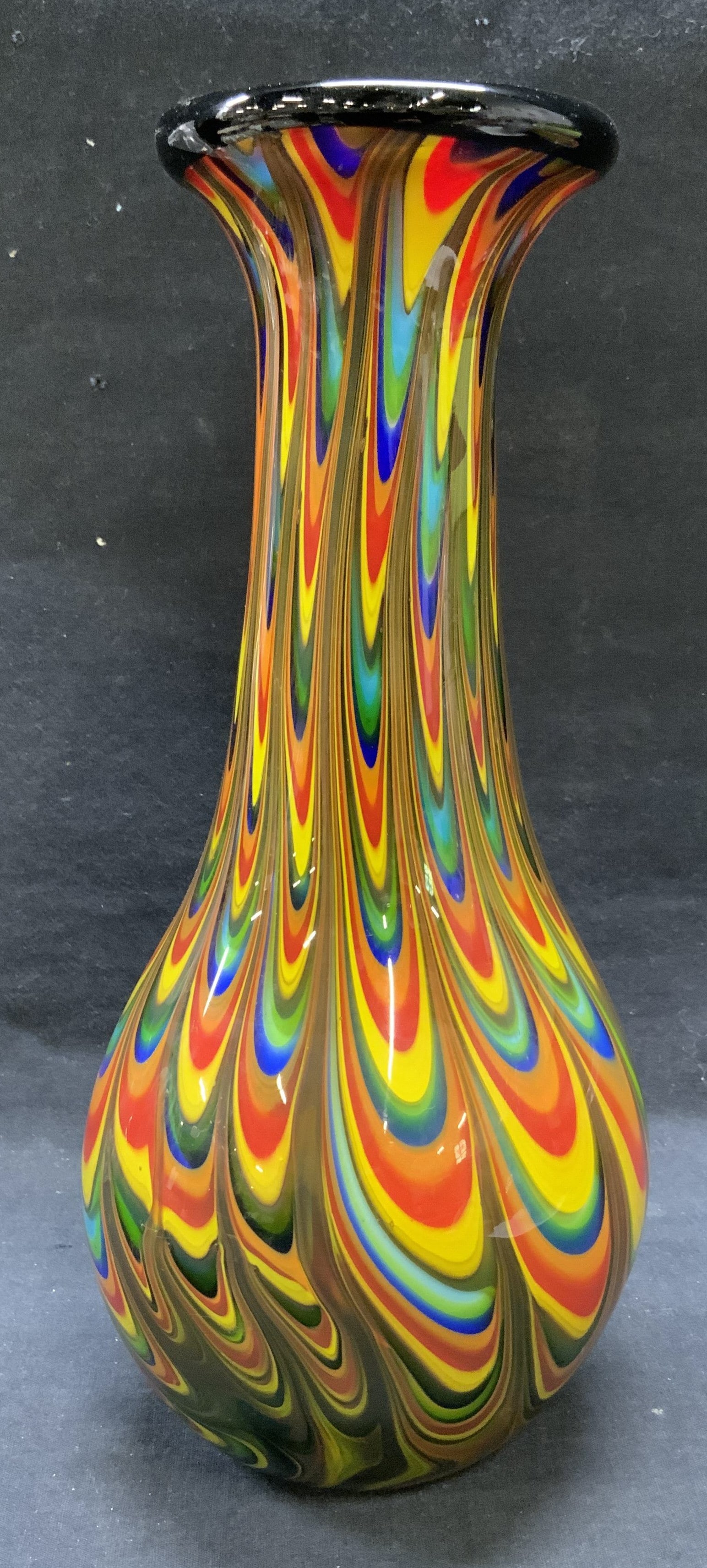 Hand Blown Rainbow Feather Pull Art Glass Vase: Hand blown multi color rainbow art glass vase with feather pull design. Thick walled glass, piece is heavy. Measures approx. 5.5 x 12.5 inches. Some surface wear including scratching observed. Art gla