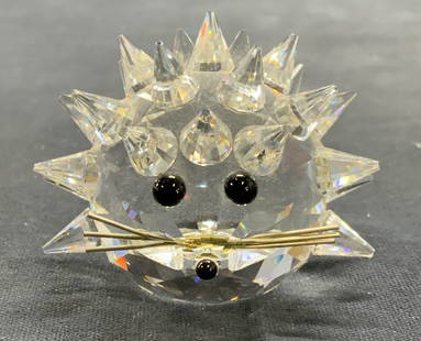 Vintage Swarovski Crystal Porcupine Figural: Vintage Swarovski Crystal porcupine figurine. Raised spike surface with wire and cabochon detail. Signed to underside. Measures approx. 2 inches wide. Some surface wear including scratching