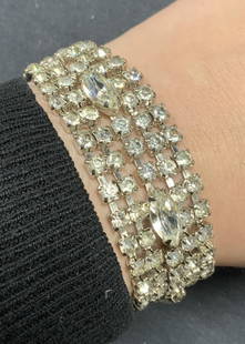 Vintage Silver Tone Crystal Bracelet: Vintage silver tone crystal bracelet. Measures approx. 7 inches long. Some surface wear including scratching observed. Estate jewelry, costume jewelry, cocktail jewelry, fashion jewelry,