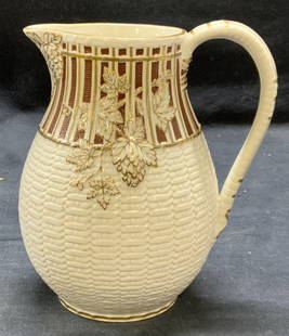 Antq W. B. Cobridge Gilt Porcelain Pitcher England: Antique William Brownfield Cobridge porcelain pitcher, white with gilt decoration. Raised basket weave and grape motif. Trademarked to underside. Made in England. Measures approx. 5.5 x 6.25
