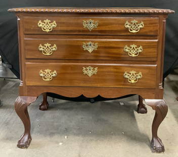 Vintage Queen Anne Style 3 Drawer Lowboy Dresser: A vintage Queen Anne style lowboy dresser with brass hardware and claw & ball feet. Dovetailing to the drawers. Measures approx. 32H x 34W x 19D in. Discoloration and wear to surface present.