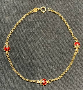 Vintage Hallmarked 18k Gold Ladybug Bracelet: Vintage hallmarked 18k gold bracelet with enameled ladybug motif. Hallmarked illegibly and marked 750. Measures approx. 7 inches long. Total weight 1.3 dwt. Some surface wear including scratching