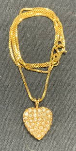 Vintage 14K Gold & Diamond Heart Necklace: Vintage 14k gold pendant necklace with heart shaped pendant and diamond accents. Marked 585. Drop length approx. 7.75 inches. Pendant measures approx. .75 inches long. Total weight 5.8 grams.