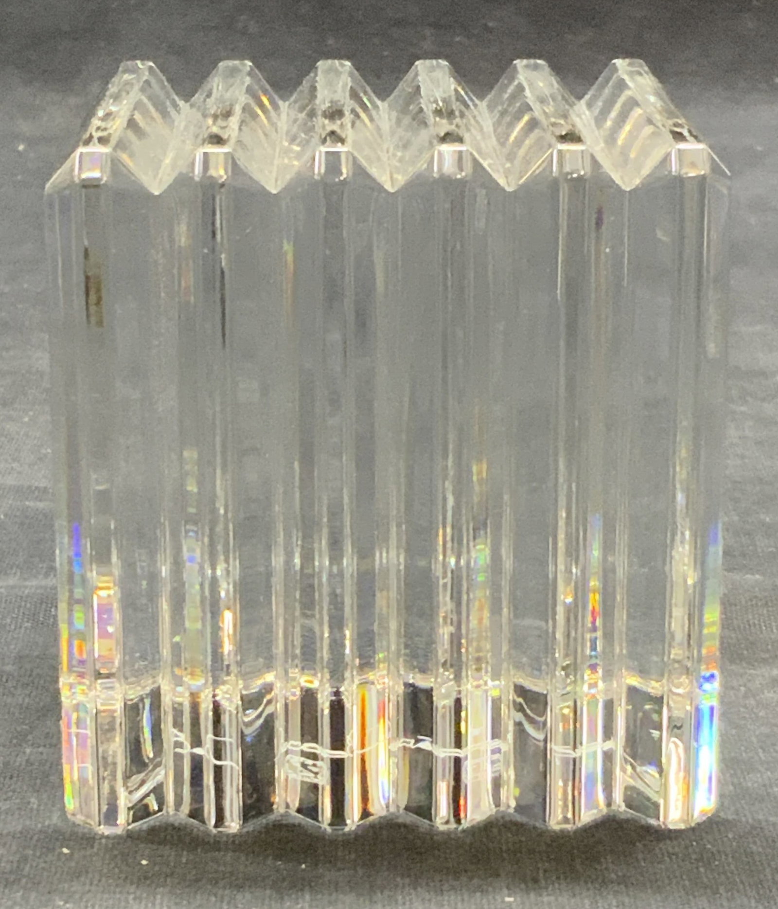 Baccarat Cut Crystal Square Paperweight, France: Baccarat cut crystal paperweight. Raised ribbed motif square shape. Signed to underside. Made in France. Measures approx. 2.75 x 2.75 x 2.75 inches. Some surface wear including scratching observed. Ba