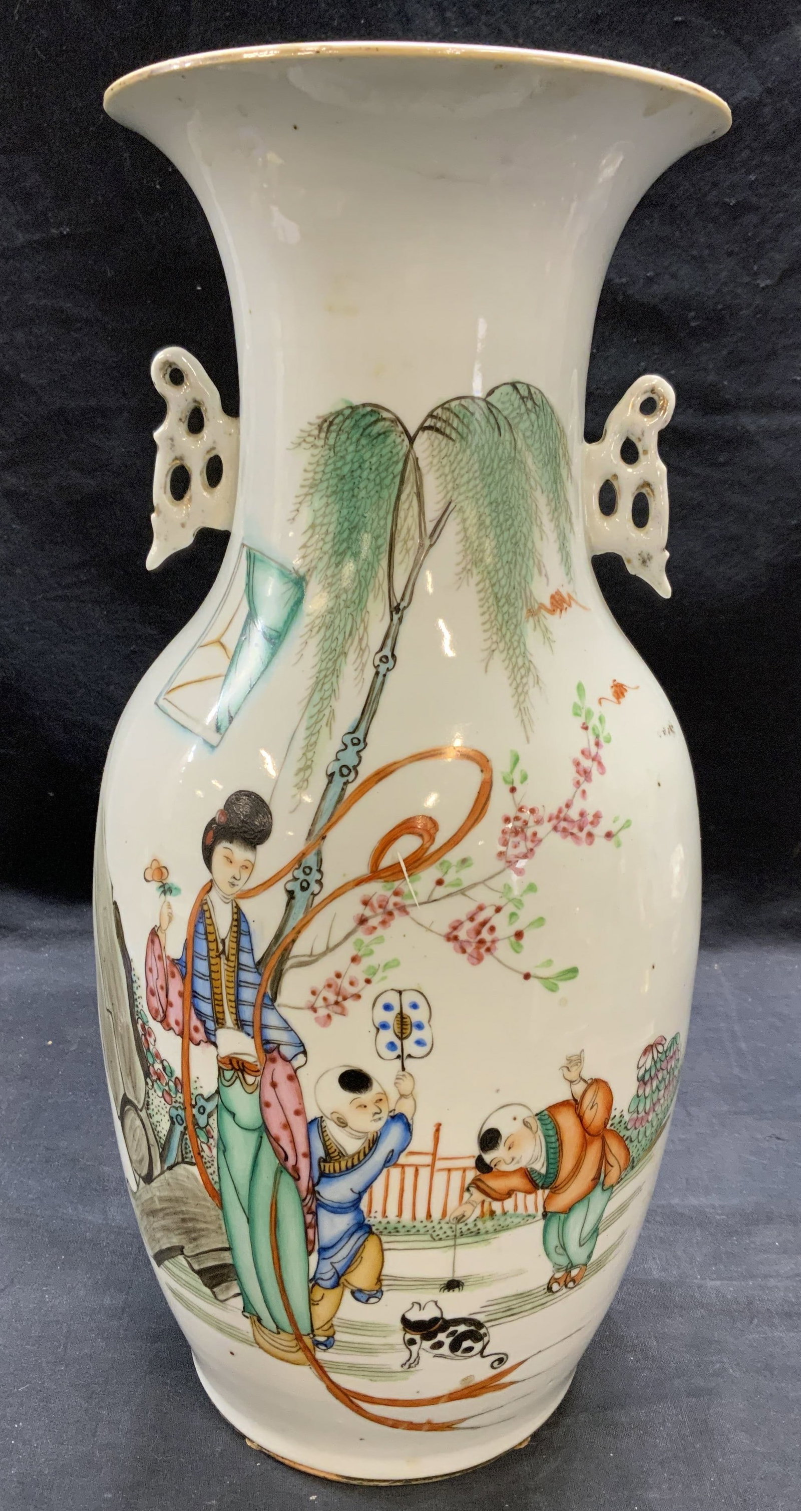 Antique Chinese Porcelain Figural Vase: Antique Chinese porcelain vase with hand painted figural motif and calligraphy to reverse. Measures approx. 7 x 17 inches. Piece has weight. Some surface wear including scratching and hairline cracks