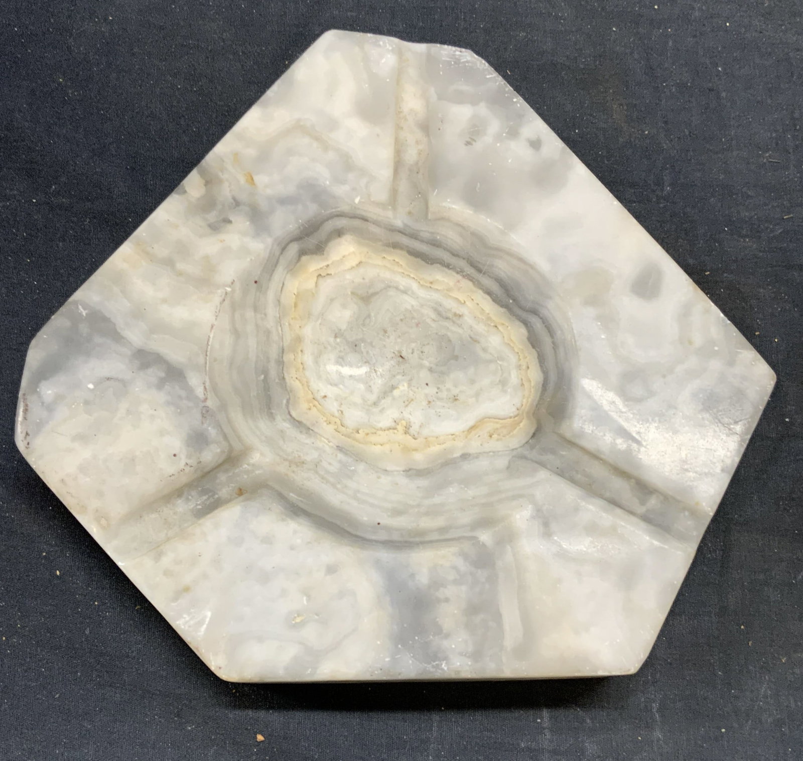 Vintage Banded Carved Stone Ashtray, Mexico: Vintage gray and white toned banded carved stone ashtray. Made in Mexico. Piece is heavy. Measures approx. 10 x 9 x 1.75 inches. Some surface wear including scratching and chipping observed. Ashtray, 