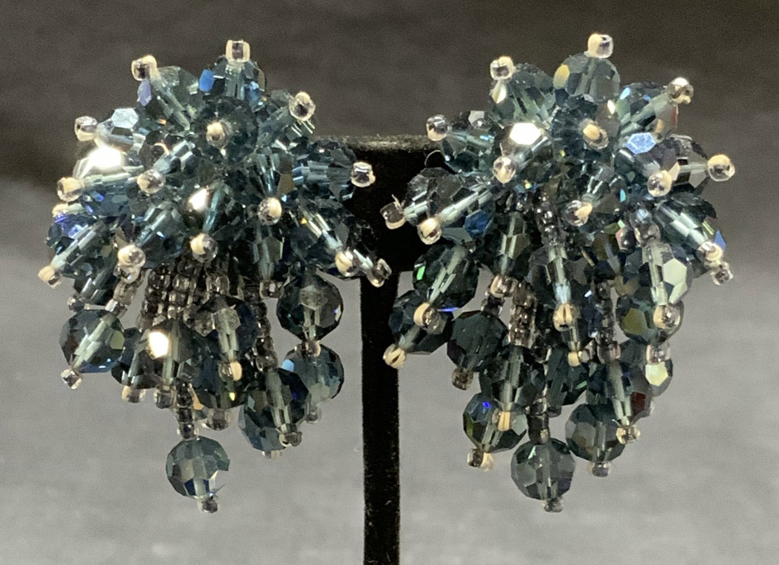 Vintage Lois Ann Blue Crystal Earrings: Vintage Lois Ann blue crystal beaded earrings. Signed on clip on backing. Measures approx. 2 inches long. Some surface wear including scratching observed. Estate jewelry, costume jewelry, cocktail jew