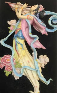 Chinese P an Chin Lien Goddess Wall Decor: Chinese Mythological feitian goddess playing the flute, floating amongst the Lei- wen clouds. Goddess of prostitution, Based in Chinese Mythology. Polyestone / resin wall hanging in colors of