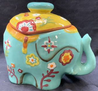 World Market Ceramic Hand Painted Elephant Vessel: Hand painted ceramic vessel of an elephant in teal and hand painted details, marked on underside world market Approx 9 inches tall and 10 inches long Moderate wearing to surface due to age and use