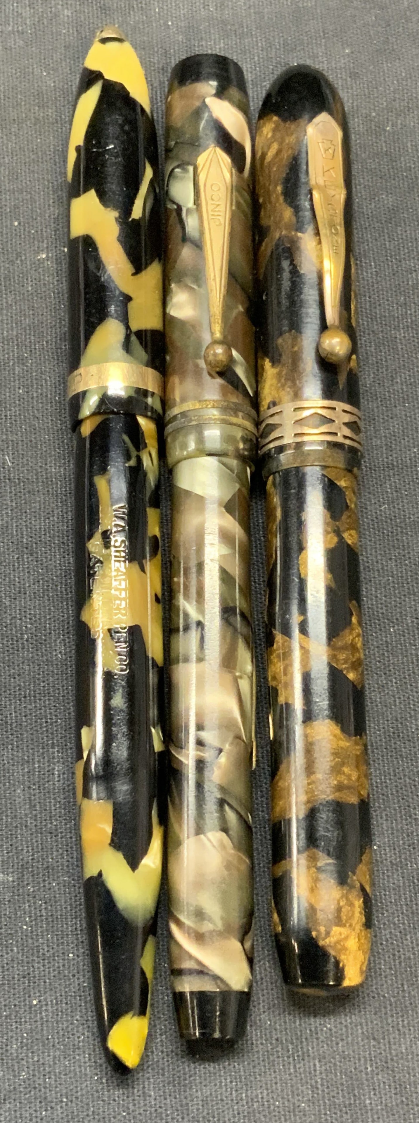 Lot 3 Schaefer Jinco & Keystone Pen & Cases: Schaefer fountain pen with acrylic case. Not tested for function. Jinco acrylic pen case. Keystone acrylic pen case. All pieces signed. Largest measures approx. 5.5 inches long. All pieces have surfac