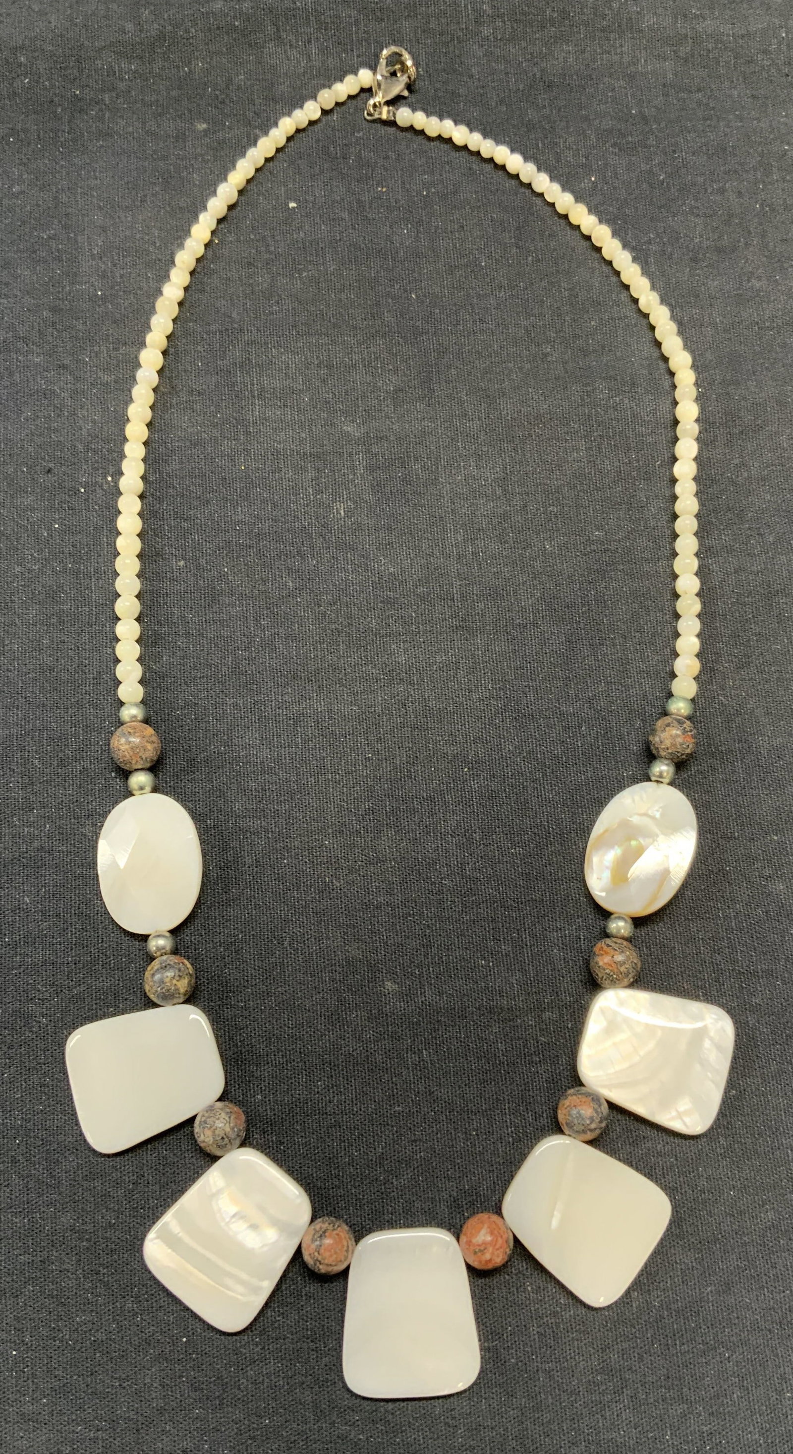 Vintage Mother of Pearl Beaded Necklace: Vintage mother of pearl and stone beaded necklace. Drop length approx. 9.5 inches. Some surface wear including scratching observed. Estate jewelry, costume jewelry, cocktail jewelry, fashion jewelry, 