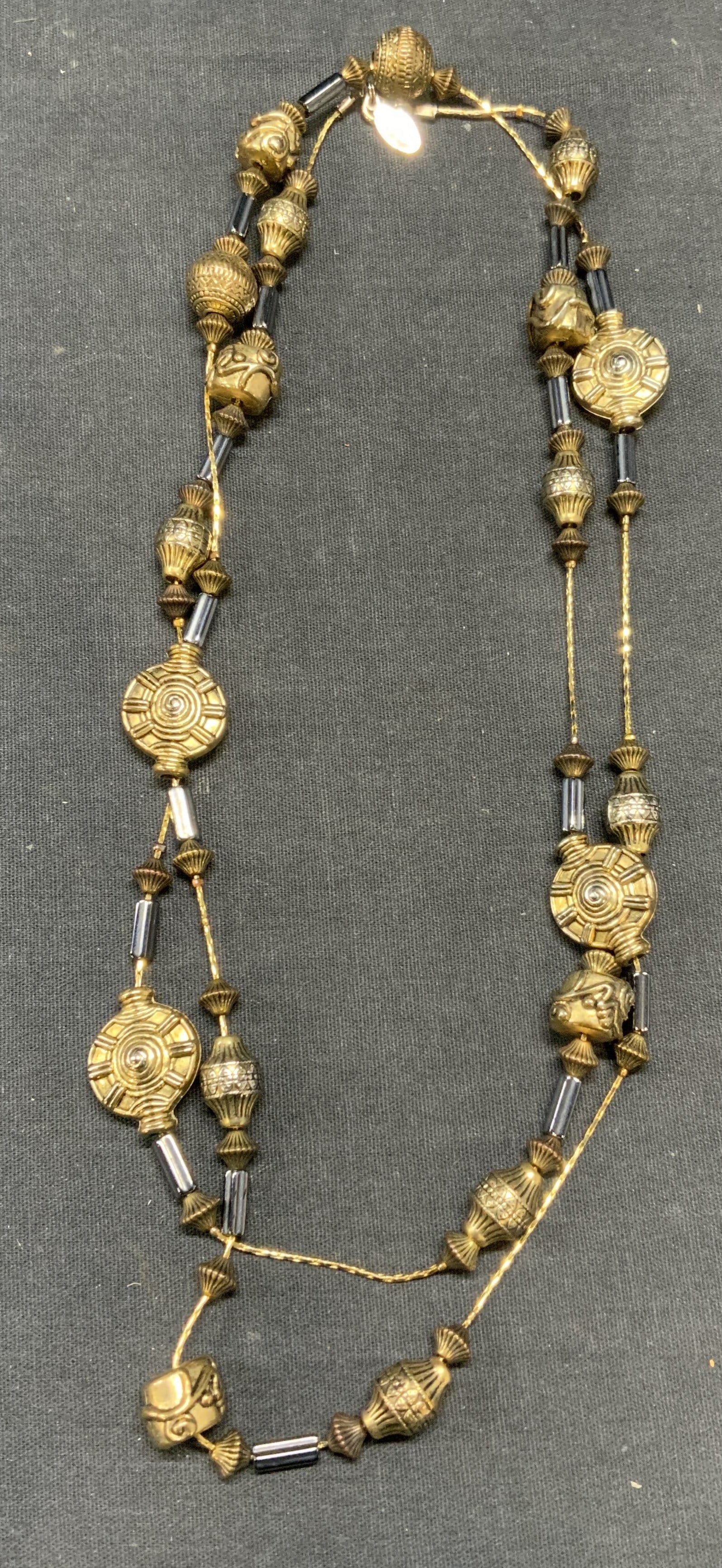 Seasonal Whispers Gold Tone Beaded Necklace: Seasonal Whispers gold tone necklace with embossed beaded decoration. Signed on hang tag. Drop length approx. 21.5 inches. Some surface wear including scratching observed. Estate jewelry, costume jewe