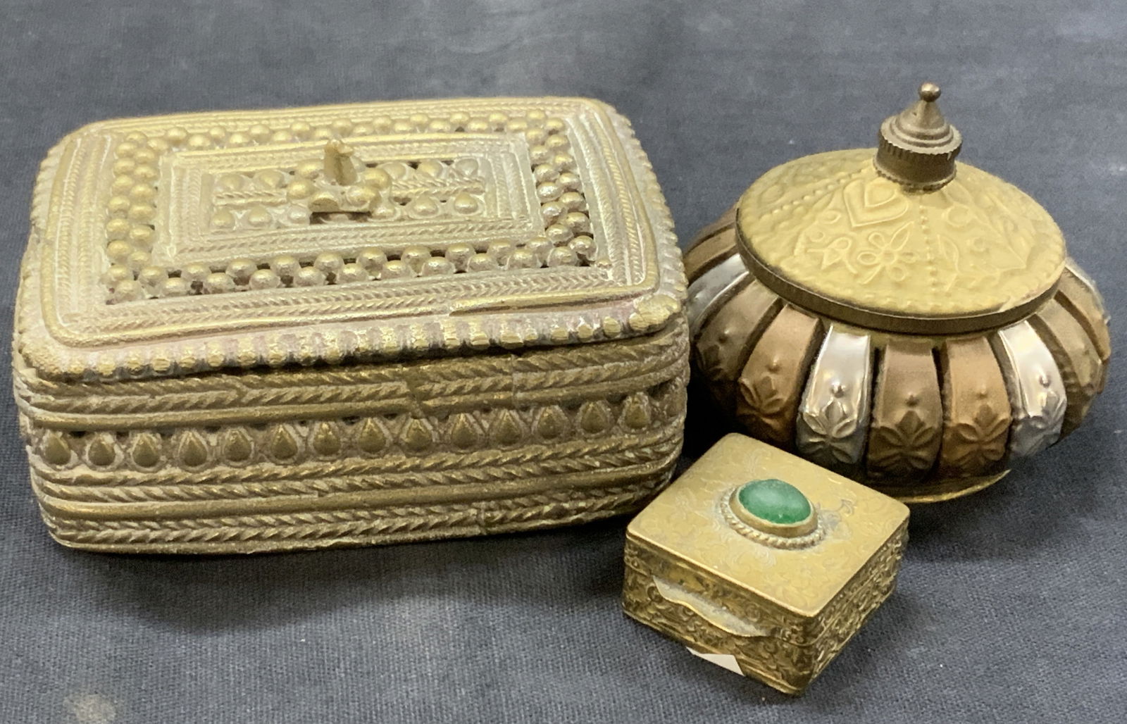 Lot 3 Pewter & Brass Pill Boxes, India & Italy: Lot of 3 pill boxes. 1 Pewter made box with intricate etching on exterior being 3 x 2.4 x 1.5 inches. 1 made with copper, silver toned and brass metal, marked made in India and smallest box at 1.25 x