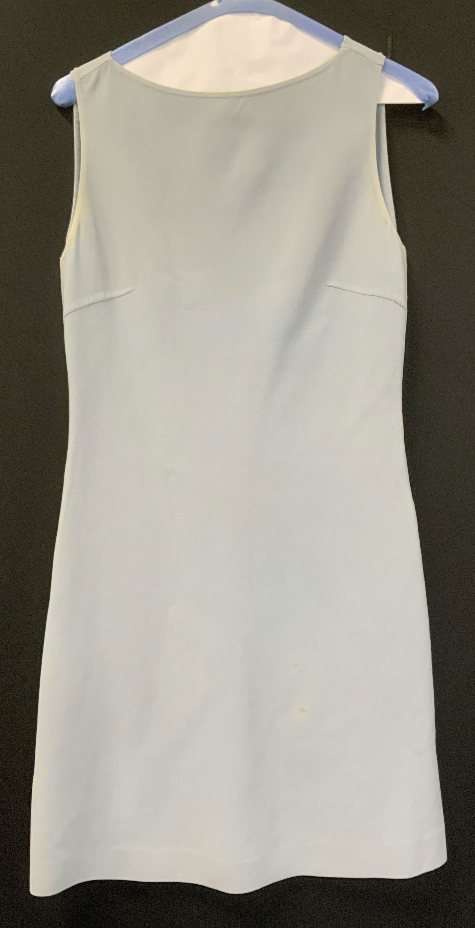 CELINE Sleeveless Wool Dress, France: Light blue sleeveless dress , made in France. Designer Celine Size 36. 96% Virgin wool..4% spandex. 33.5 in long. Some discoloration along color and arm sleeves, couple spots near lower part of dress.