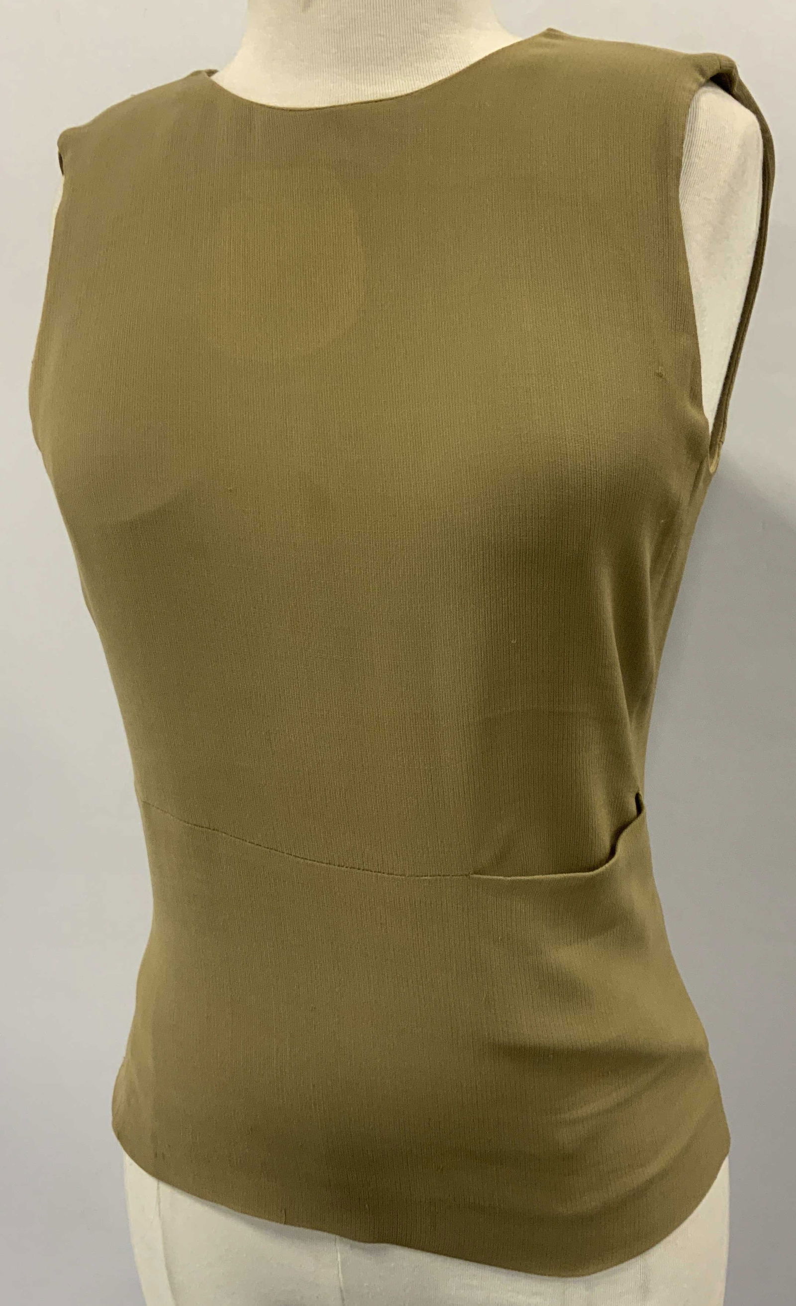 Emporio Armani Sleeveless Blouse: Emporio Armani Sleeveless blouse, zip up backside. Original clothing item num. is 20467291. Fabric label has been cut out, designer label is affixed to clothing. Top has a large round blemishing near