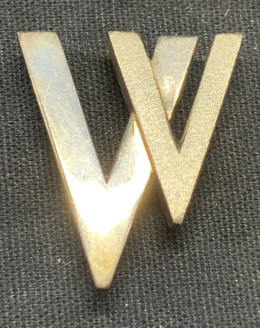NCJW Sterling Silver Geometric Brooch: NCJW sterling silver brooch with geometric motif. Tests for sterling using PuriTEST kit. Signed to underside. Measures approx. 1 1/8 x 1 inches. Total weight 6.5 grams. Some surface wear including scr