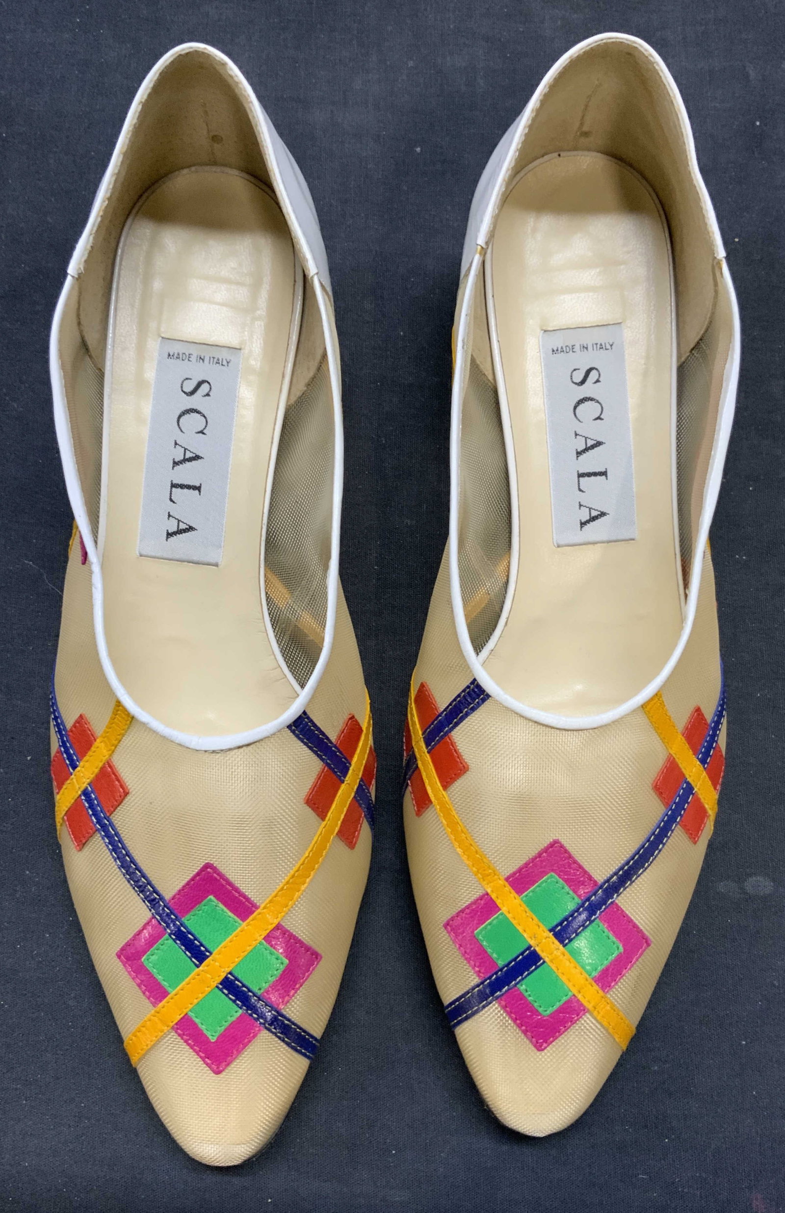 Scala Beige Leather Flats, Italy: Scala beige toned mesh and multi color leather flats with geometric motif. Size 41. Made in Italy. Some wear to material and soles consistent with exposure. Includes shoe box. Scala, scala shoes, scal