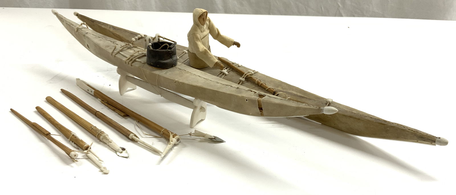 Lot 8 Leather Canoes, Figure, & Spears (1 of 6)
