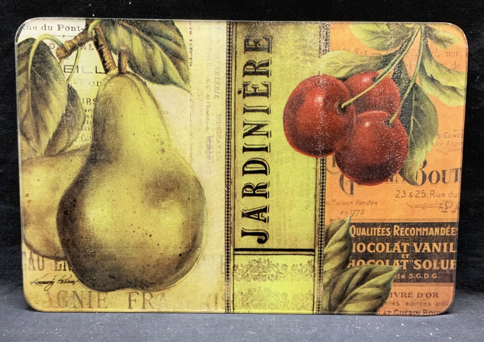 Textured Glass Fruit Motif Table Accessory: textured glass table accessory/placemat with fruit motif. Measure approx. 18 x 12 inches. Some surface wear including scratching observed. Table accessory, table decor, fruit table accessory, glass ta