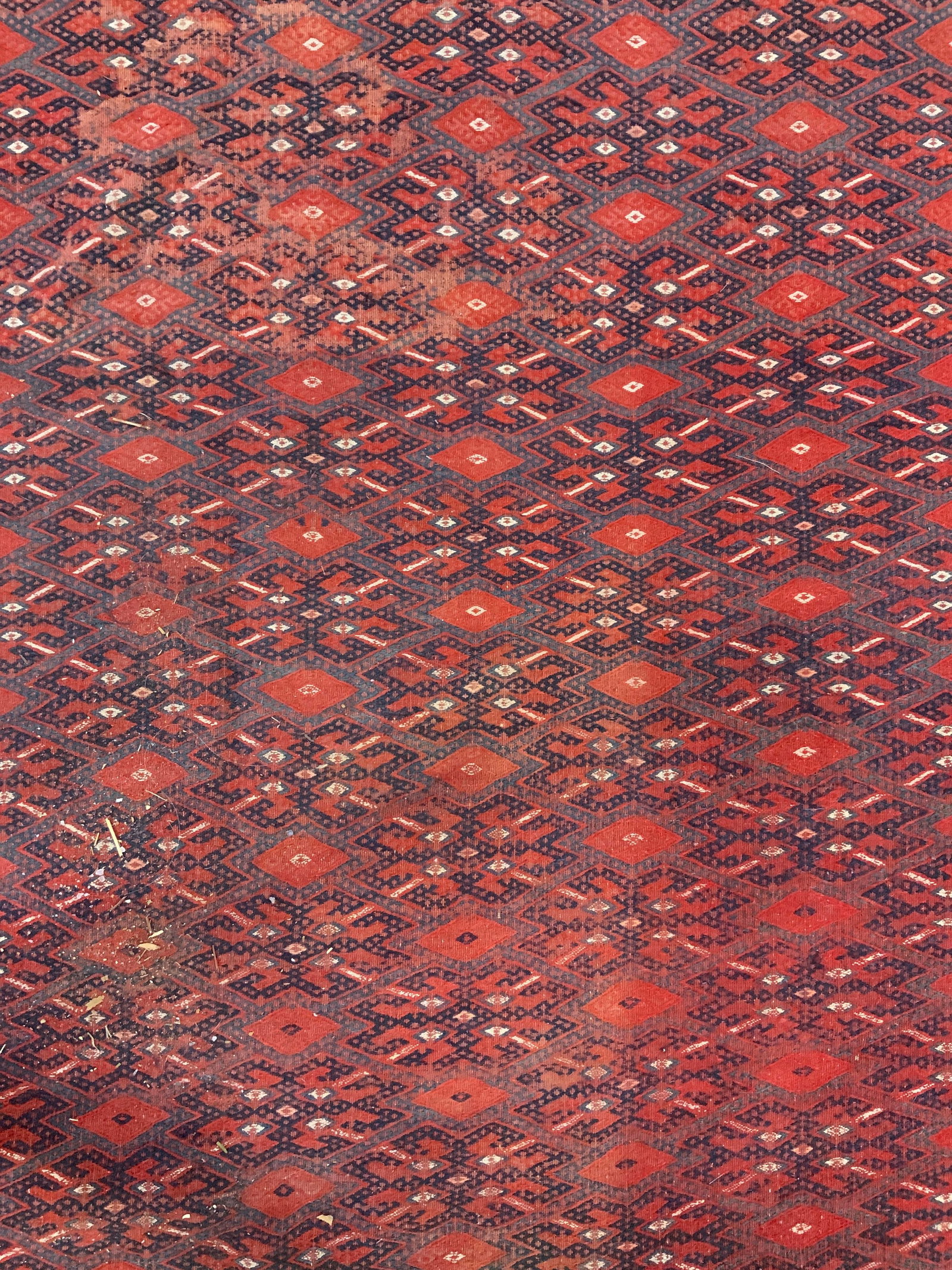 KAZEMI Turkmen Kilim Iranian Handmade Wool Rug: Tag on underside reads KAZEMI & CO INC MADE IN IRAN. Rug appears to be antique possibly vintage. Rug has multi toned geometric pattern detail. Edges have sand toned fringes. Rug measures approximately