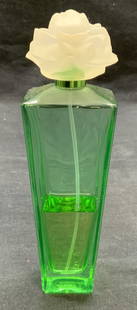 Elizabeth Taylor Gardenia Eau De Perfume: Elizabeth Taylor Gardenia perfume in green glass bottle with flower motif top. Measures approx. 2 x 1.5 x 6.5 inches. as Is, partially filled. Elizabeth Taylor, Elizabeth Taylor gardenia,