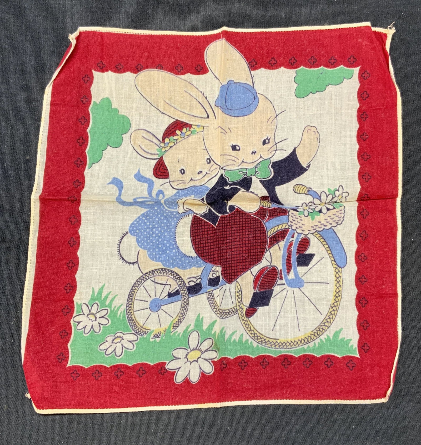 Vintage Red Cotton Bunny Rabbit Handkerchief: Vintage red and white bunny rabbit and bicycle motif handkerchief, material feels like cotton. Measures approx. 8.5 x 9 inches. Some wear to material including blemishes observed. Handkerchief, vintag