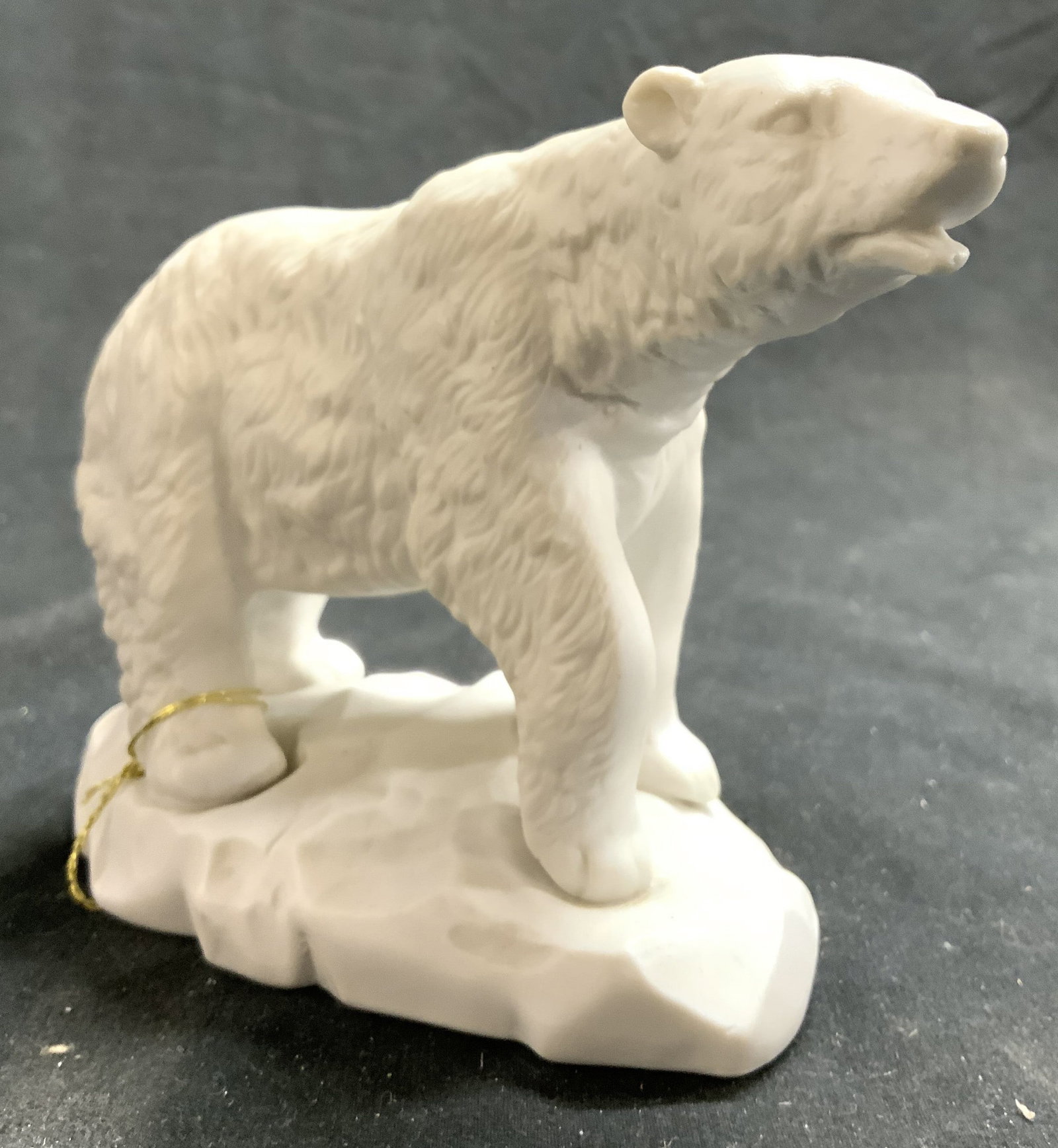 ALDON ACCESSORIES LTD Porc Polar Bear: Underside is inscribed ALDON ACCESSORIES LTD NYC. Piece includes original tag. Piece depicts a polar bear standing on all fours. 5.5 inches long 4 inches tall 2.5 inches wide. Bear, polar bear, porcel