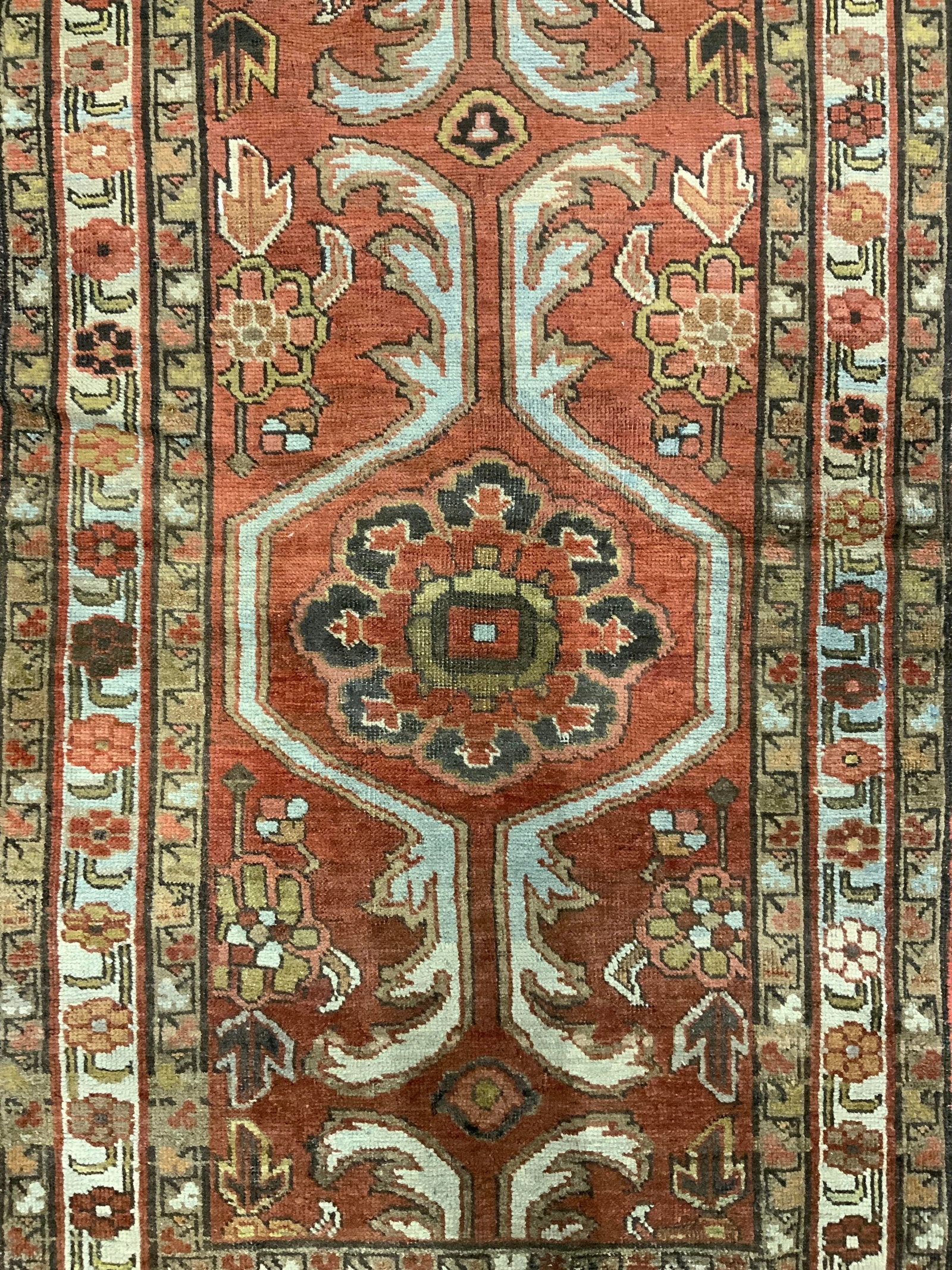 Vintage Handmade Persian Wool Area Rug: Rug is handmade & wool. Piece has intricate multi toned floral motif & geometric detail. Rug is vintage. Appears to be Persian. Rug measures approximately 56 inches long 34 inches wide. Rug, carpet, w