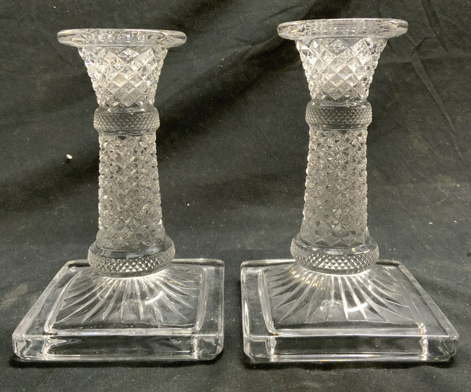 2 Westmoreland English Hobnail Glass Candlesticks USA: Lot includes 2 candlesticks. Candlesticks are glass. Each piece has square form bases & diamond pattern relief detail. Appears to be Westmorland English hobnail pattern, unmarked. Each candlestick mea