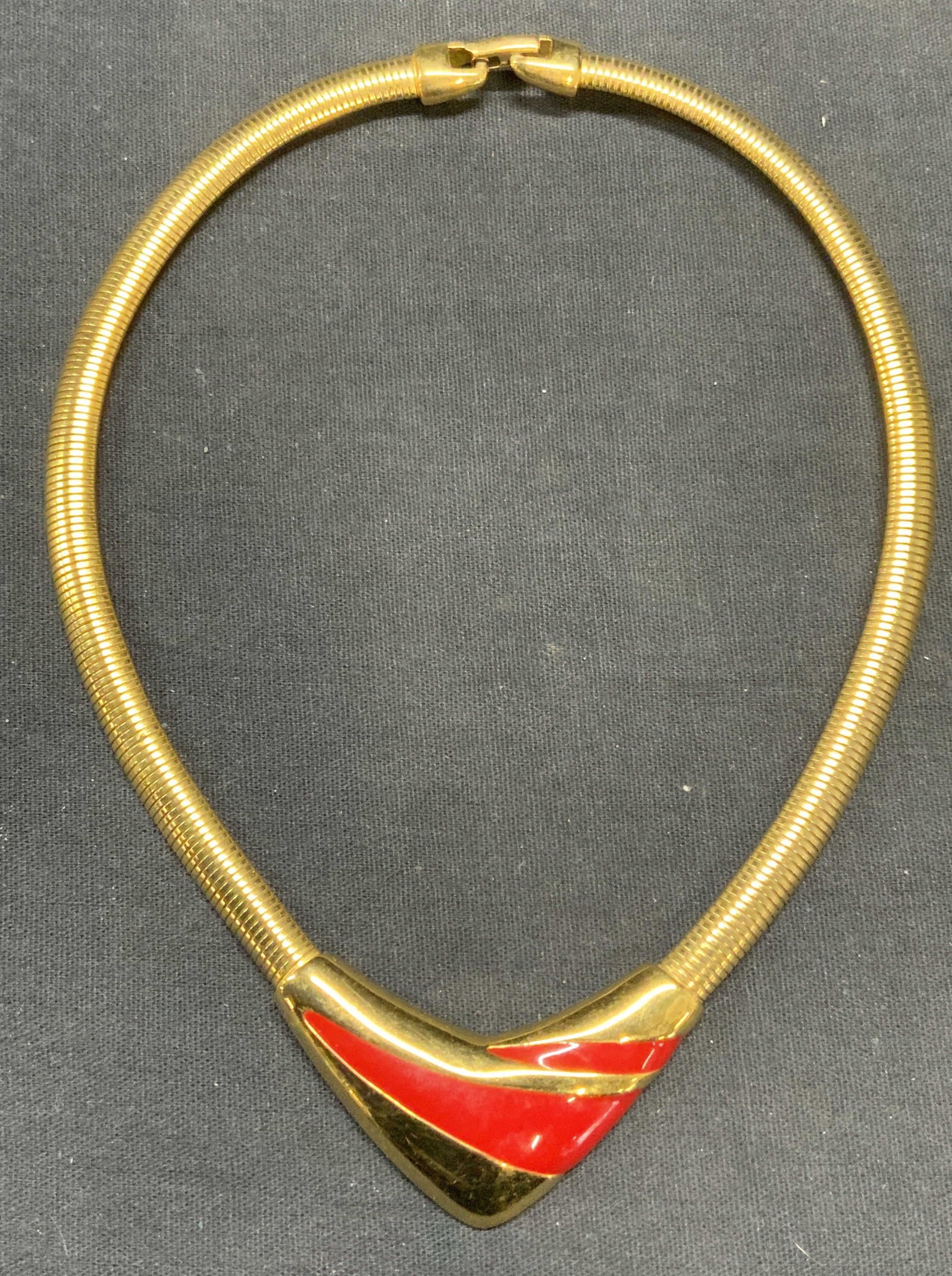 Vintage Napier Gold Tone Choker Necklace: Vintage Napier gold tone red enamel choker necklace. Signed to underside. Drop length approx. 5.5 inches. Some surface wear including scratching observed. Estate jewelry, costume jewelry, cocktail jew