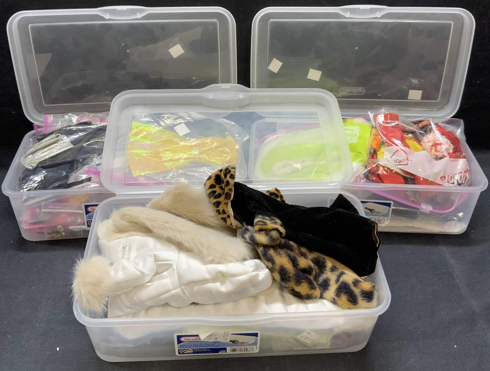 Group 50+ Doll Clothing & Accessories: Group of 50+ pieces of doll clothing and accessories. Includes containers. Containers measure approx. 13 x 7.5 x 4.5 inches. All pieces have some wear consistent with exposure. Doll clothing, doll acc