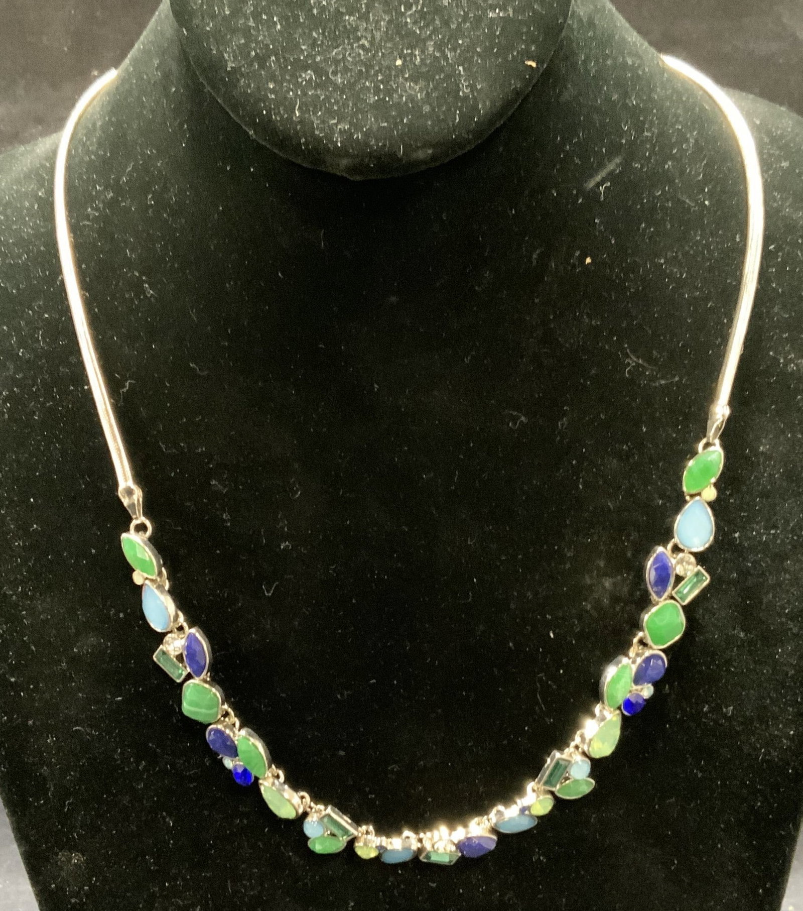 Silver Tone Green & Blue Crystal Necklace: Silver tone necklace with green and blue crystal decoration. Drop length approx. 10 inches. Some surface wear including scratching observed. Estate jewelry, costume jewelry, cocktail jewelry, fashion 