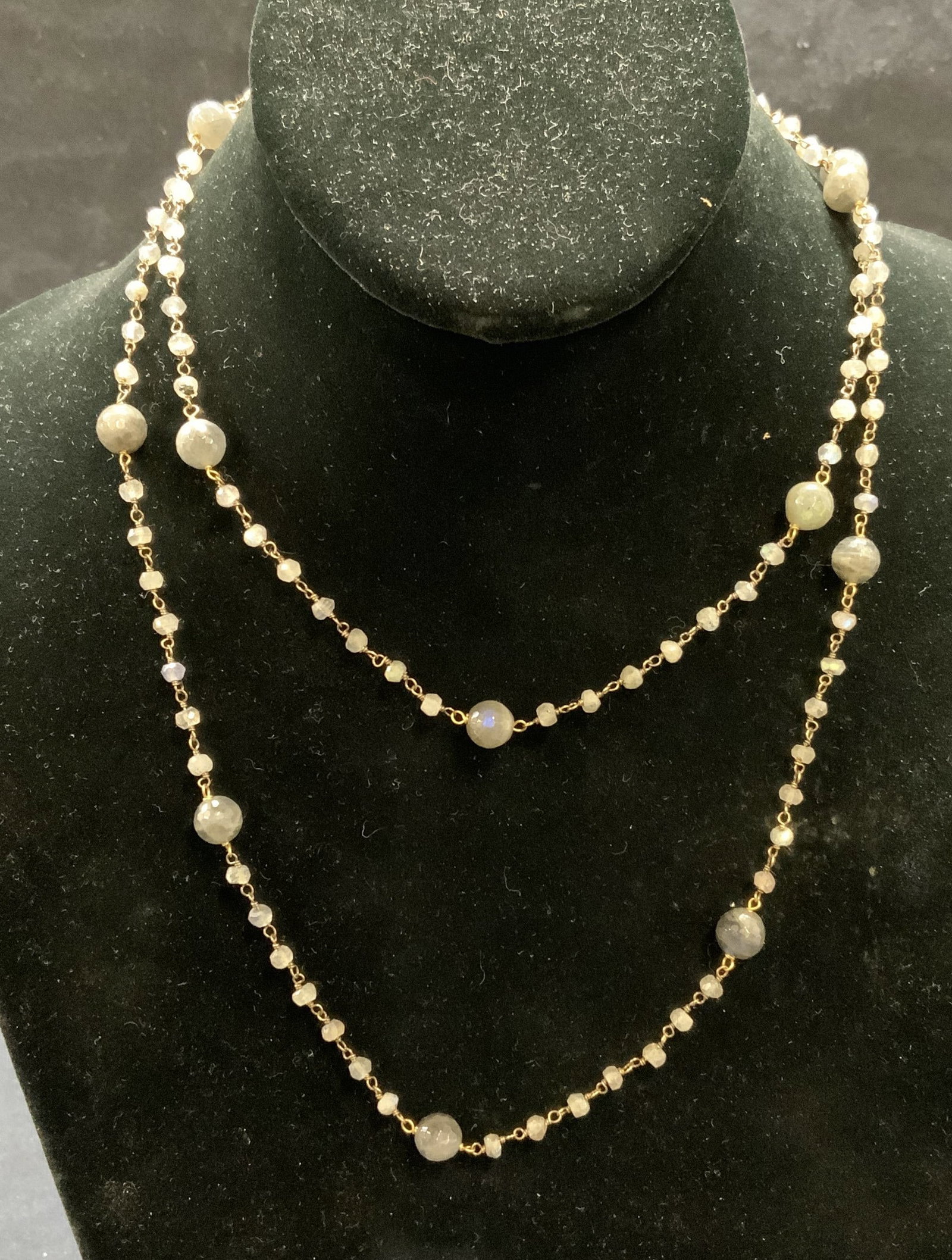Vintage Gold Tone Gray Crystal Necklace: Vintage gold tone and gray crystal beaded necklace. Drop length approx. 17.5 inches. Some surface wear including scratching observed. Estate jewelry, costume jewelry, cocktail jewelry, fashion jewelry