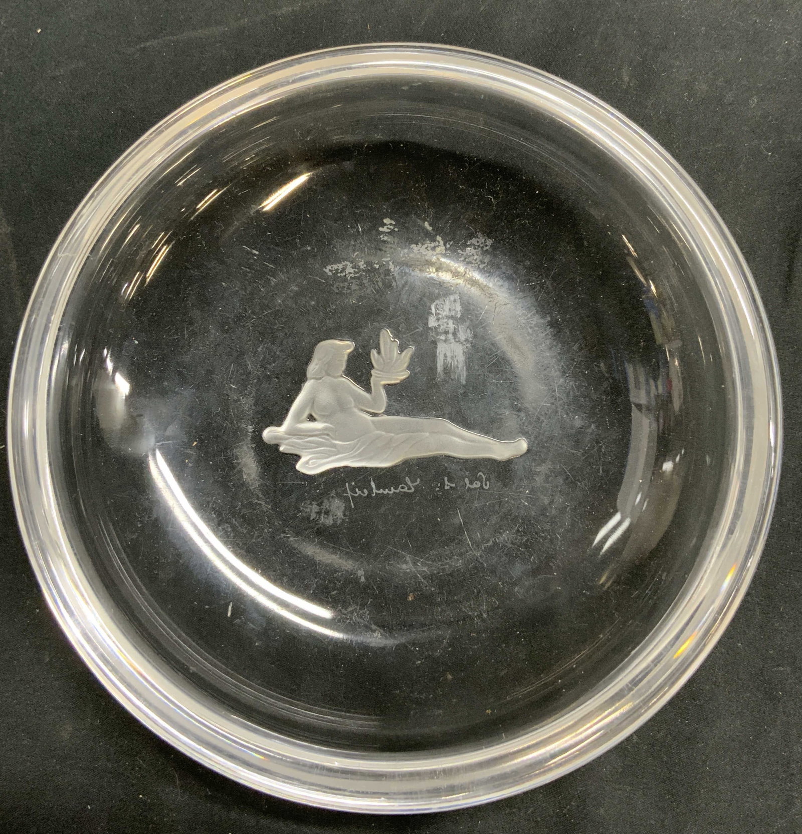 VAL ST LAMBERT Female Nude Crystal Trinket Dish: Underside is signed VAL ST LAMBERT. Trinket dish is crystal. Piece has frosted female nude figure. Trinket dish measures approximately 6 inches diameter. Trinket dish, crystal trinket dish, female nud