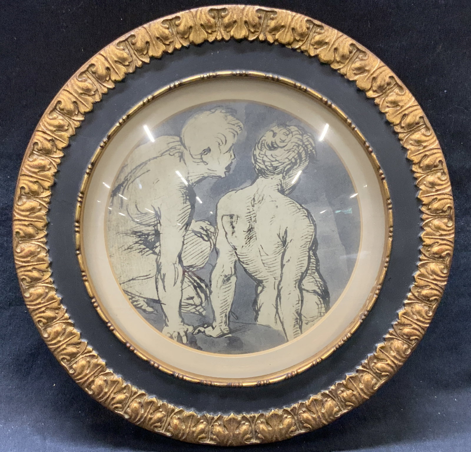 Vtg Figural Sketch Framed Lithograph: Framed lithograph of two nude male figures looking away from the viewer. Framed in a circular gold leafed wooden frame with floral motifs throughout. Approx 8 x 8 inches window measures 5.75 x 5.75 in