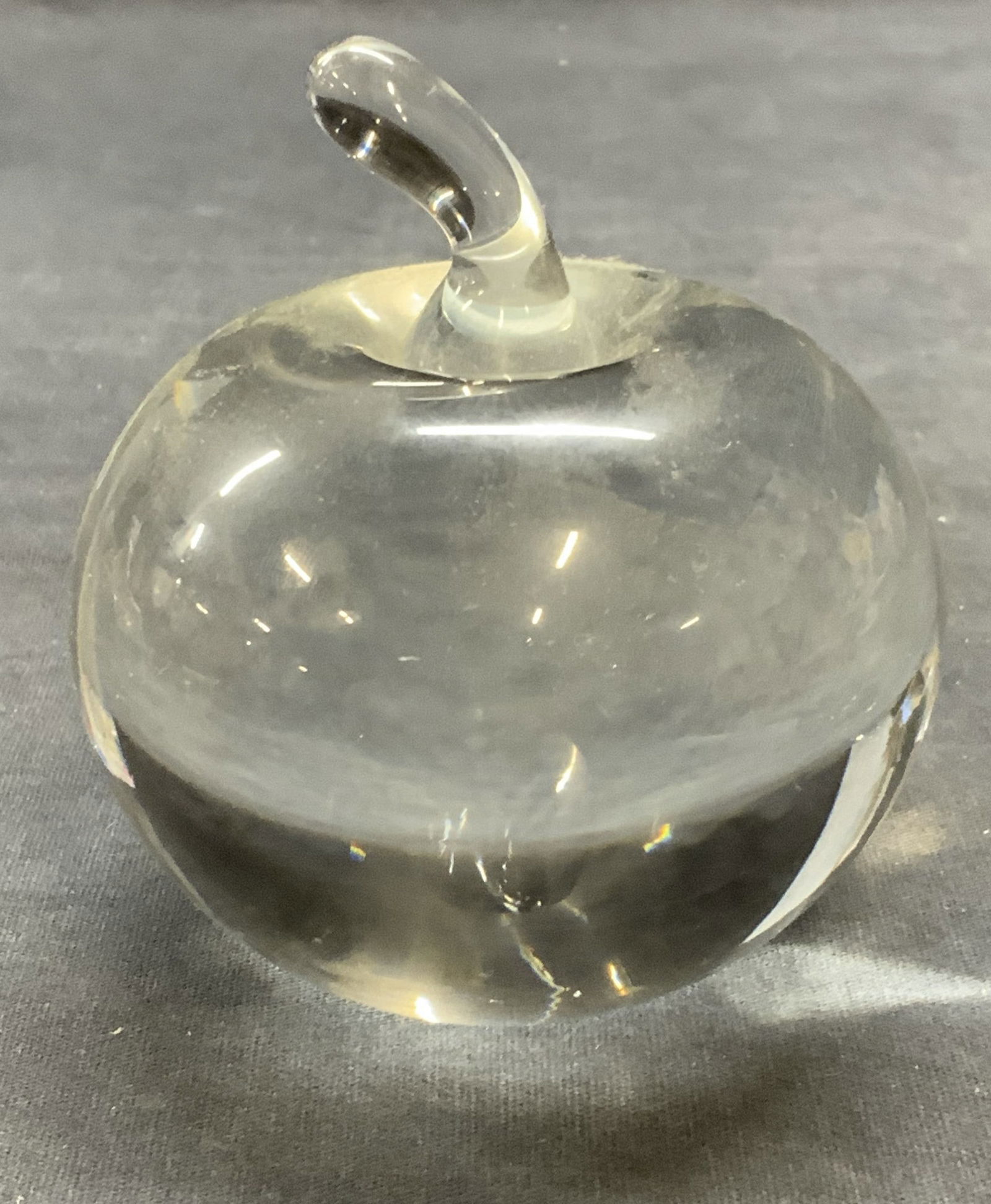 Vintage Crystal Apple Motif Paperweight: Vintage crystal apple motif paperweight. Piece has weight. Measures approx. 2.75 x 3.25 inches. Some surface wear including scratching observed. Apple paperweight, crystal apple, crystal paperweight,