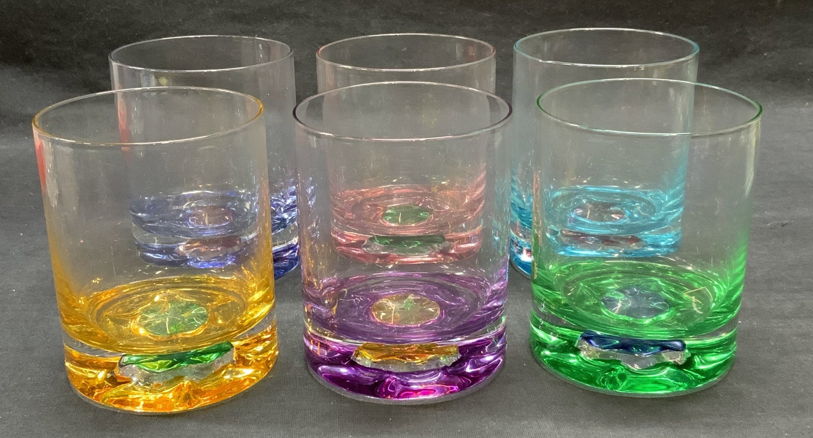 Set 6 Colored Old Fashion Glasses , France.: Set of 6 colored old fashion glasses in pink, purple, blue, green, and yellow. Measure approx. 3 x 3.75 inches. Appear Like New in original box. Made in France. Pieces have weight. Some surface wear c