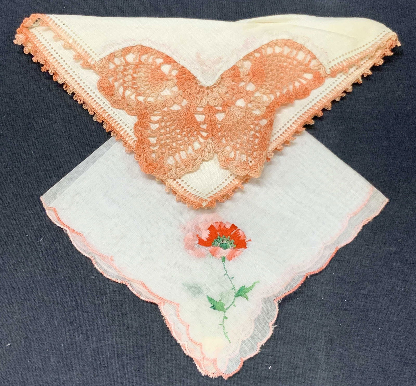 2 Lace & Embroidered Floral Linen Handkerchiefs: Lot of 2 lace and linen handkerchiefs, 1 with hand crocheted orange and red toned butterfly on corner with red and orange edges, another with a pink edge and embroidered rose on corner. Marked Ireland
