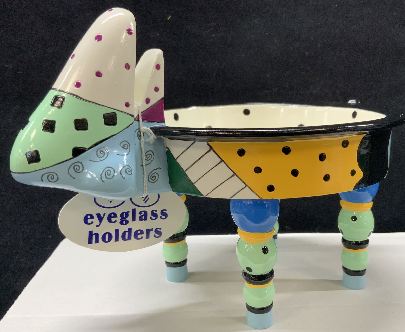 Hand Painted Composite Nose Eye Glass Holder: Hand painted eye glass holder with trinket tray and nose for eye glasses, footed and painted with geometric color blocking. Approx 5 x 5 inches. Comes with original box marked Picassos nose hand paint