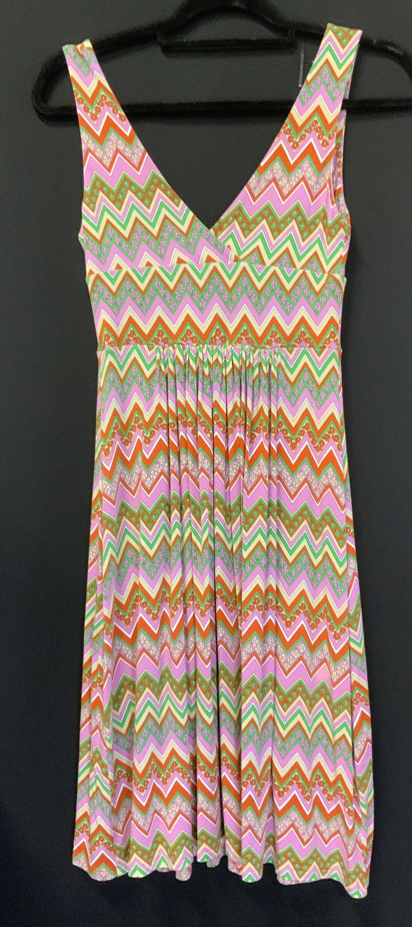 Manuel Canovas Zig-Zag Sleeveless Dress: Floral and zig- zag design sleeveless dress by designer Manuel Canovas. Nylon with stretch. V neck front and back. 39 in. Long. Waist 24 in. Ladies summer fashion, dress, designer Manuel canovas, Beac