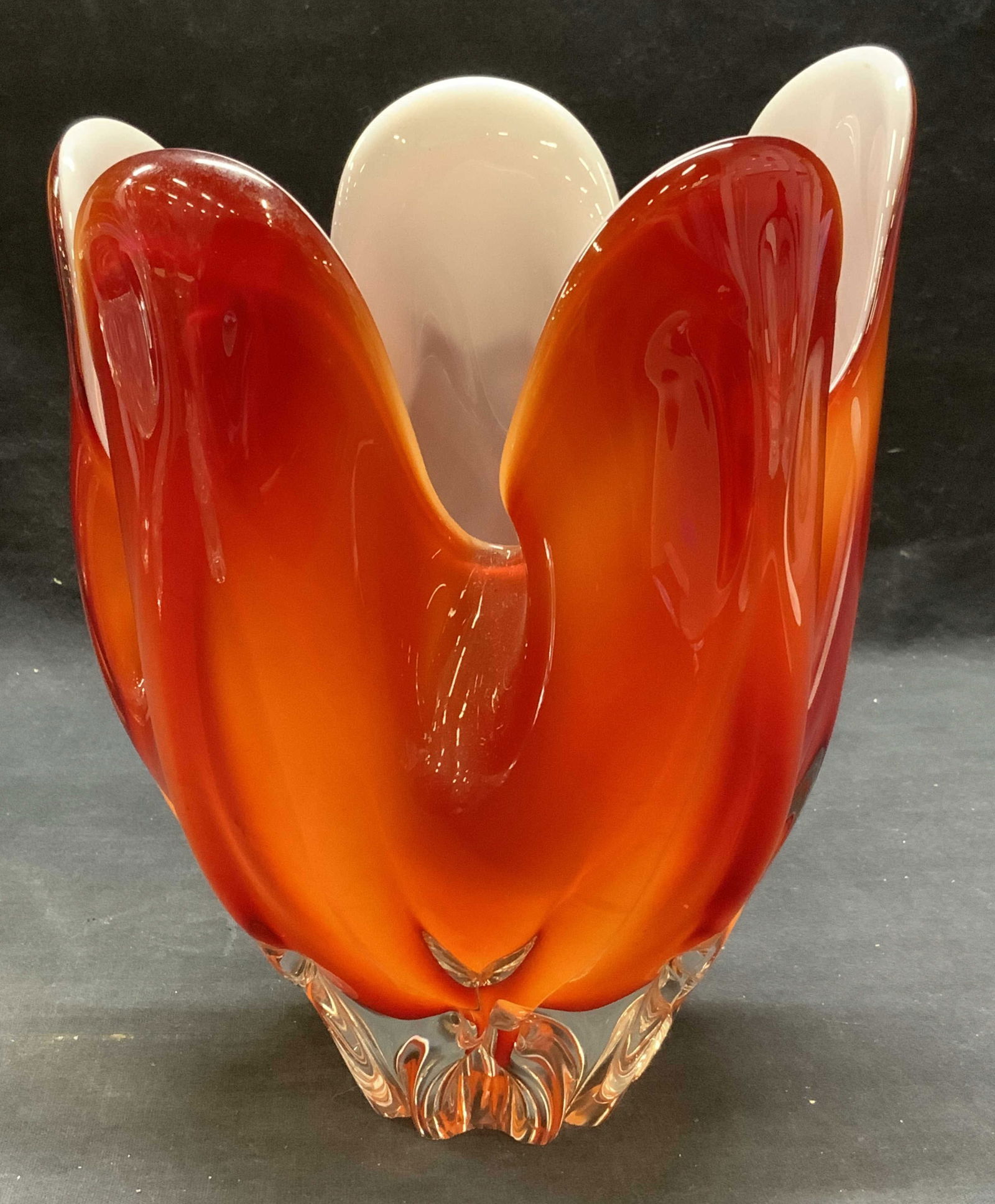 Vintage Red Art Glass Vase: Vintage red art glass vase with pulled scalloped rim. Thick walled glass, piece has weight. Measures approx. 7 x 9 inches. Some surface wear including scratching observed. Art glass, art glass vase, r