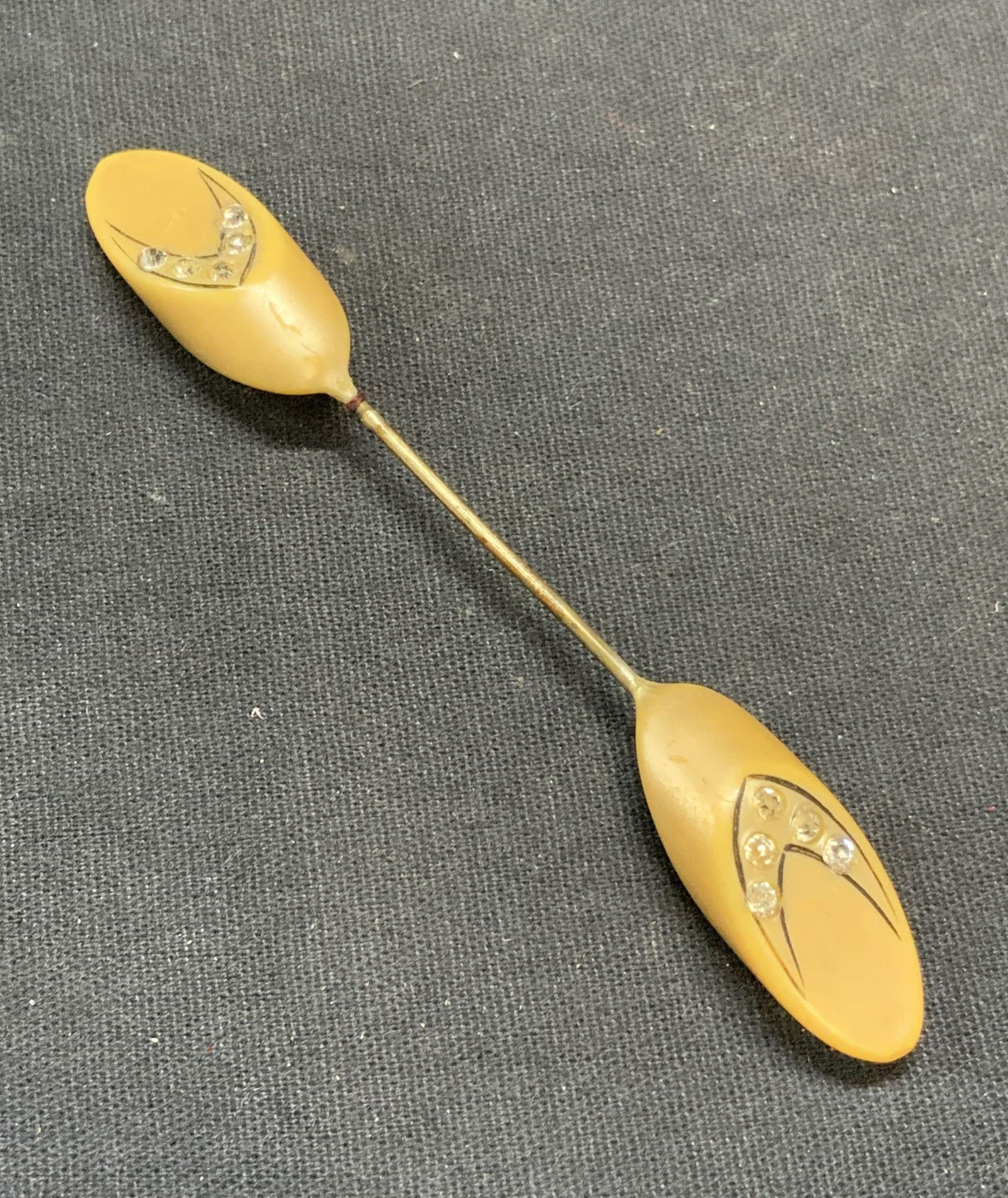 Vintage Gold Tone Lucite Crystal Pin: Vintage gold tone lucite pin with crystal decoration. Measures approx. 3.75 inches long. Some surface wear including scratching observed. Estate jewelry, costume jewelry, cocktail jewelry, fashion jew