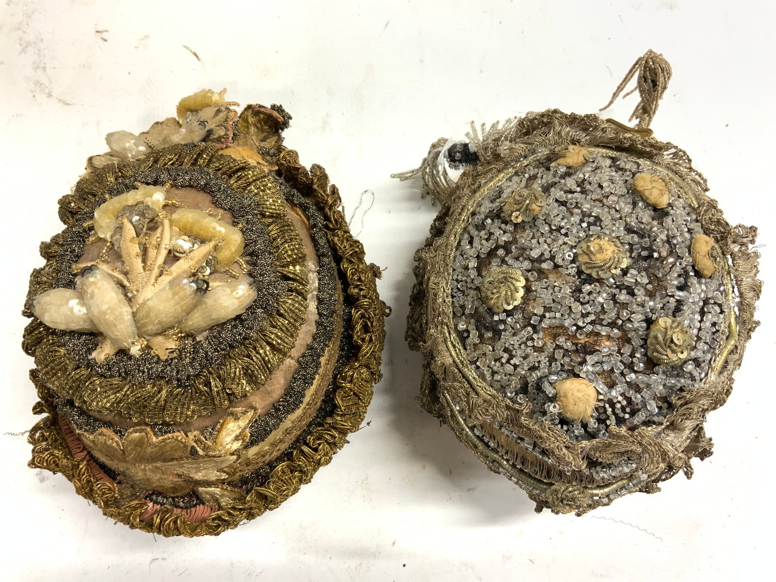 ABIGAILS COLLECTION Lot 2 Beaded Ornaments: Tag reads ABIGAILS COLLECTION. Each Piece has intricately embroidered, sequin, & beaded detail. Each piece has gold, silver, cream & brown tones. Larger ornament measures approximately 9 inches tall 6