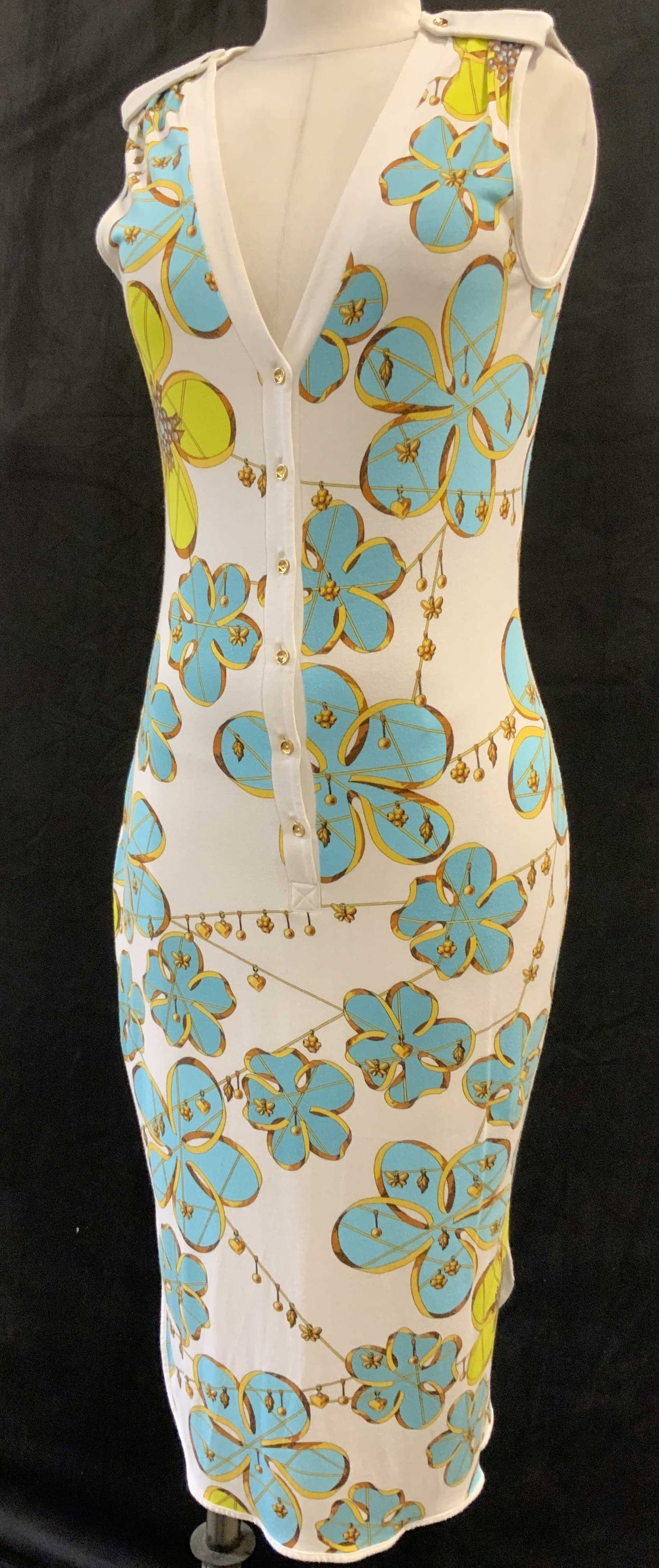 Wolford Sleeveless Summer Dress: White dress with reticulated print in turquoise, gold , and lime. Designer Wolford. Size small. Rayon with 10% elastane. Some wear to fabric consistent with use. 45 in. Long. Designer Wolfold, Summer 