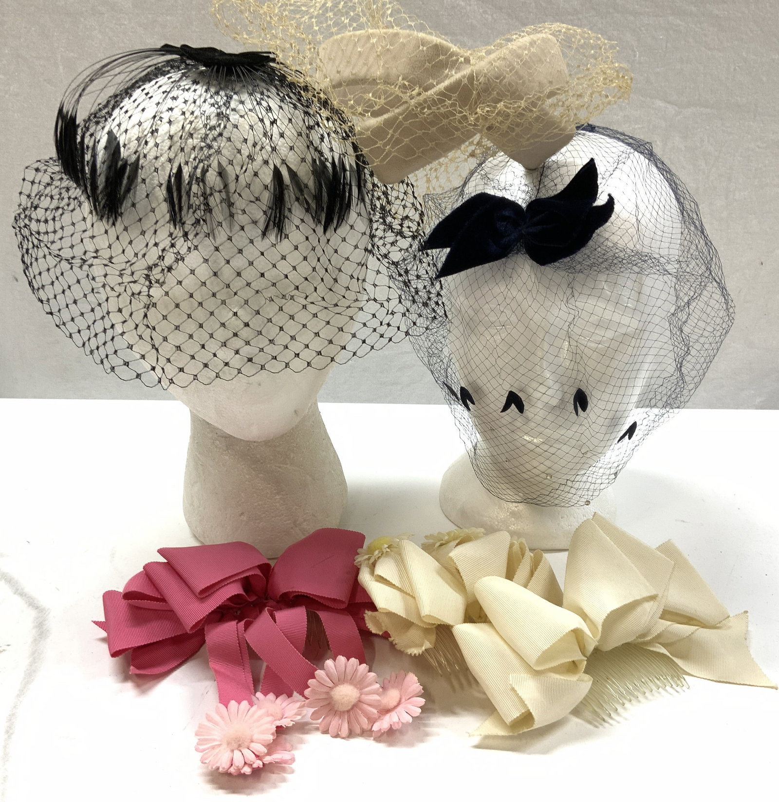 7 Fascinator Face Net & Hat, Bow Hair Combs: Vintage fascinator hat with netting and vintage fascinator head nets with feathers and bows- in black, navy, and beige., New styrofoam head mannequin, measures 9.5 in ht x 5.25 in. Wide , 7 in. Deep.,