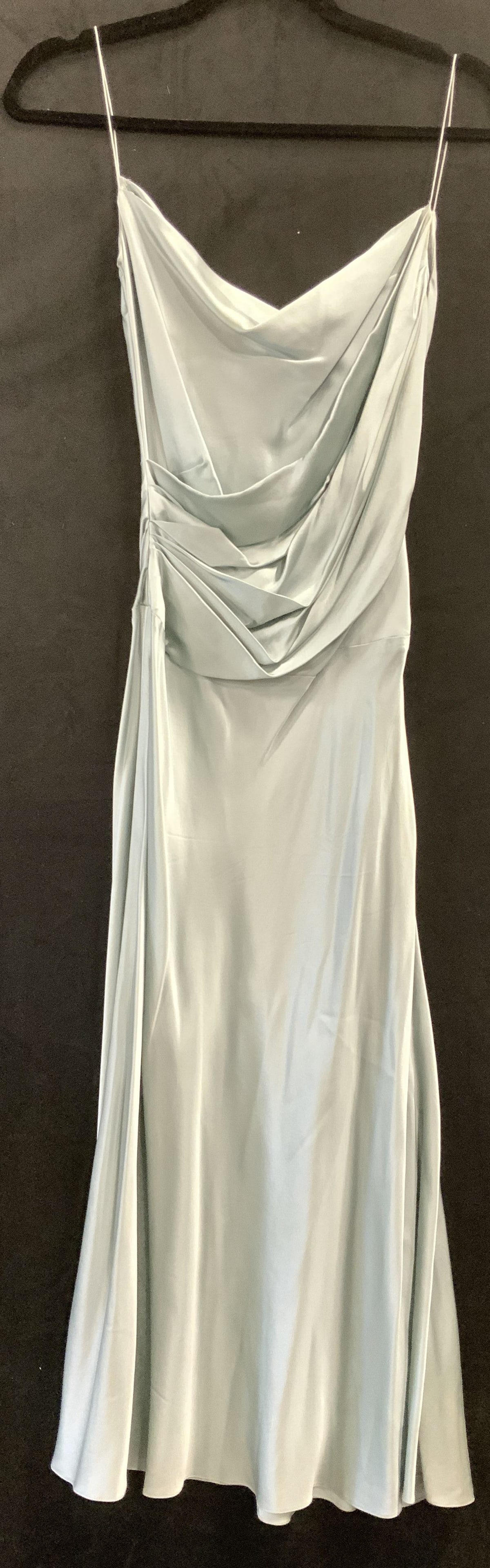 Colette Finnegan Silk Dress, Australia: Spaghetti strap silk dress in sea foam blue by designer Colette Finnegan . Made in Australia. Has a rouched waistline, side zipper and swing Flowy skirt. 49.5 in. Long. Size XS. Has a bit of silk pull