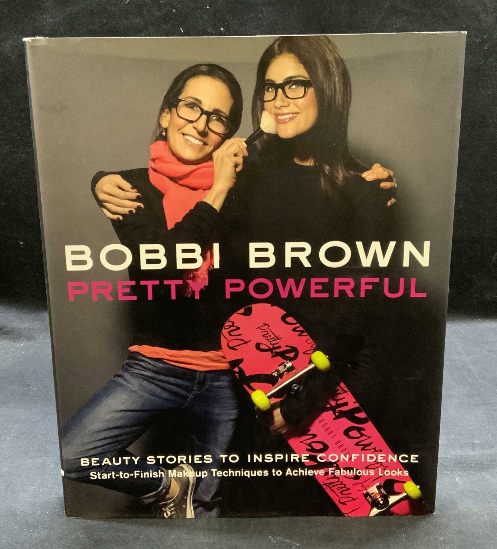 Bobbi Brown Pretty Powerful Book, Illustr 2012: Hardcover Copy of Bobbi Brown Pretty Powerful by Bobbi Brown and Sara Bliss. Published by Chronicle Books, 2012. Contains illustrations. Measures approx. 10.25 x 8.25 inches. Some wear to cover, pages