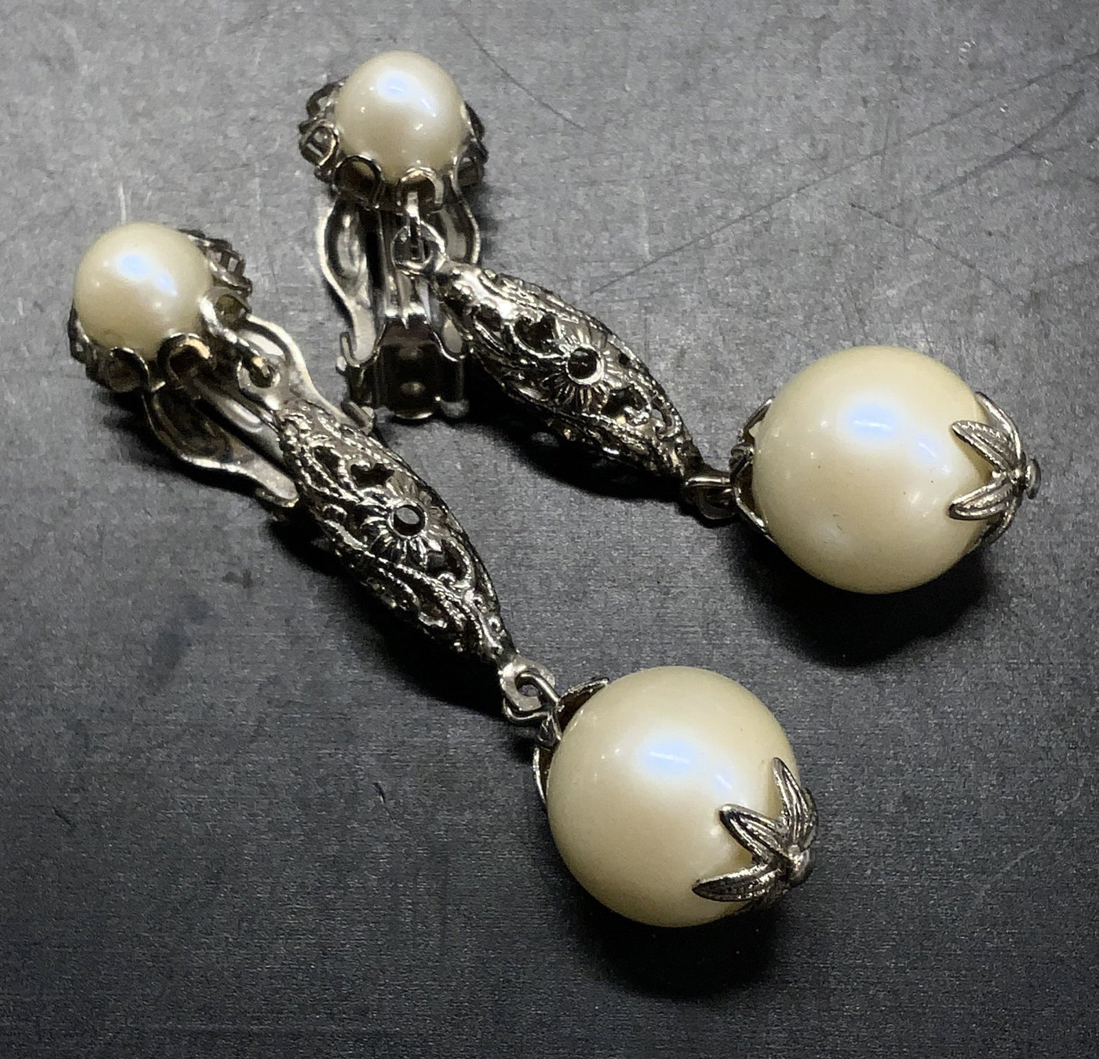 Pearl Style Clip On Pendant Earrings: Light weight silver tone and costume pearl pendant earrings. Clip on style. 2.25 in. Long. These are Victorian style. statement Jewelry, vintage jewelry, Estate Jewelry, Costume Jewelry, Ladies Wearab