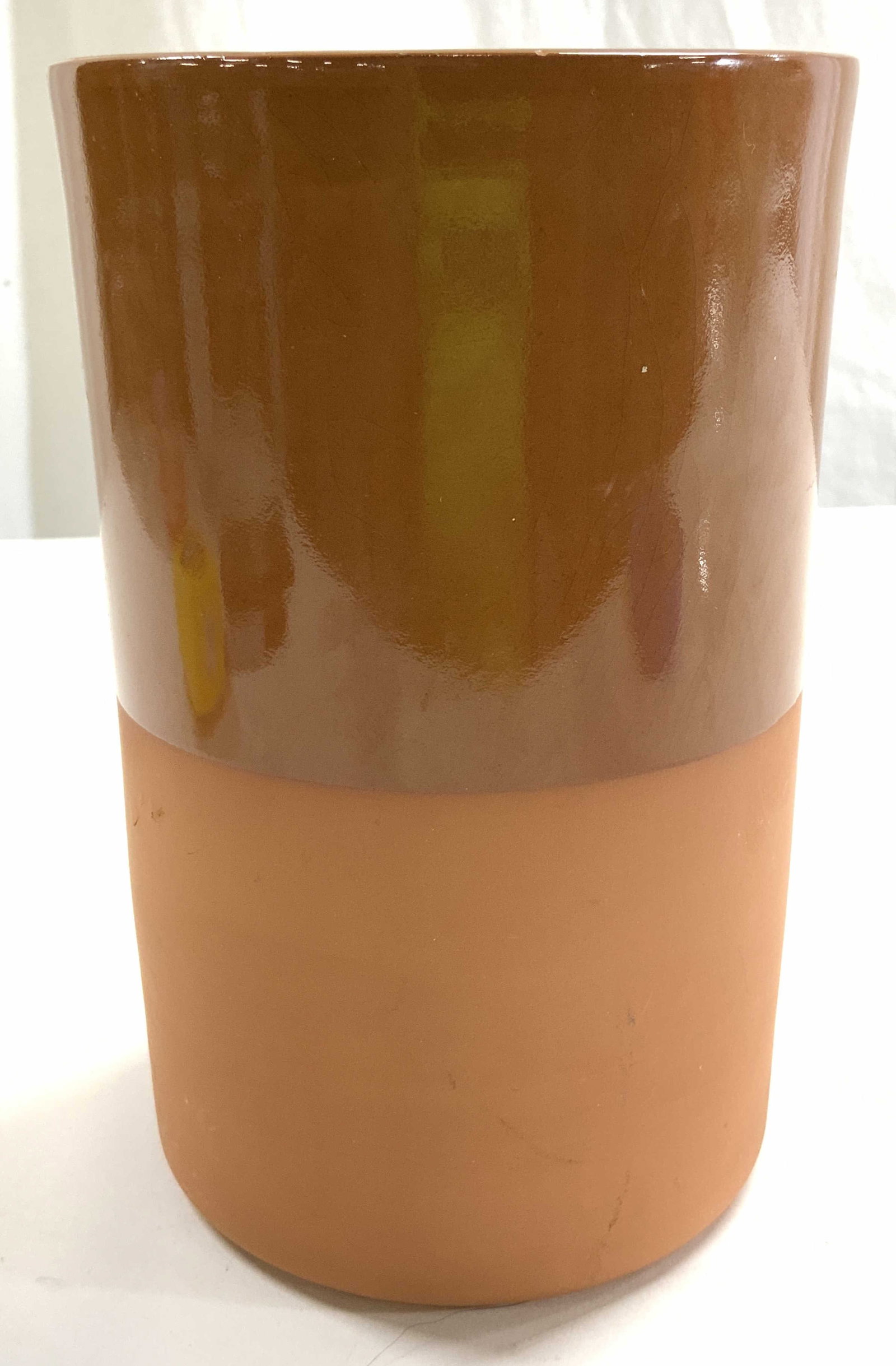 CRATE & BARREL Half Glazed Ceramic Wine Cooler: Underside is marked CRATE & BARREL. Wine cooler appears to be Ceramic possibly terra cotta. Upper half has glazed finish while lower half has matte finish. Vessel measures approximately 7.5 inches tal