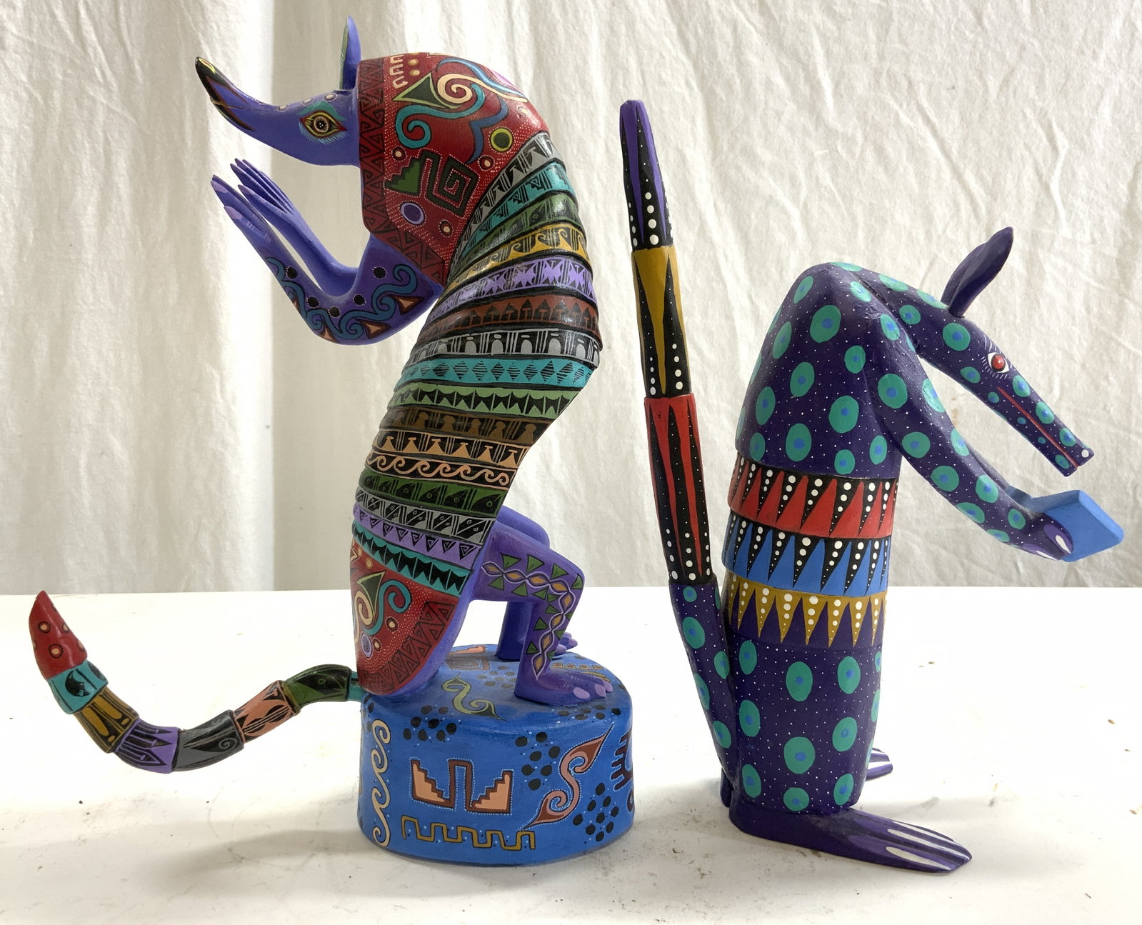 Hand Crafted Signed Mexican Wooden Animal Figures: Underside of ant eater figure is signed ALEJANDRINO FUENTES. Underside of armadillo figure is signed illegibly. Each piece is wooden. Animals figures appear to be hand painted & carved. Each have intr